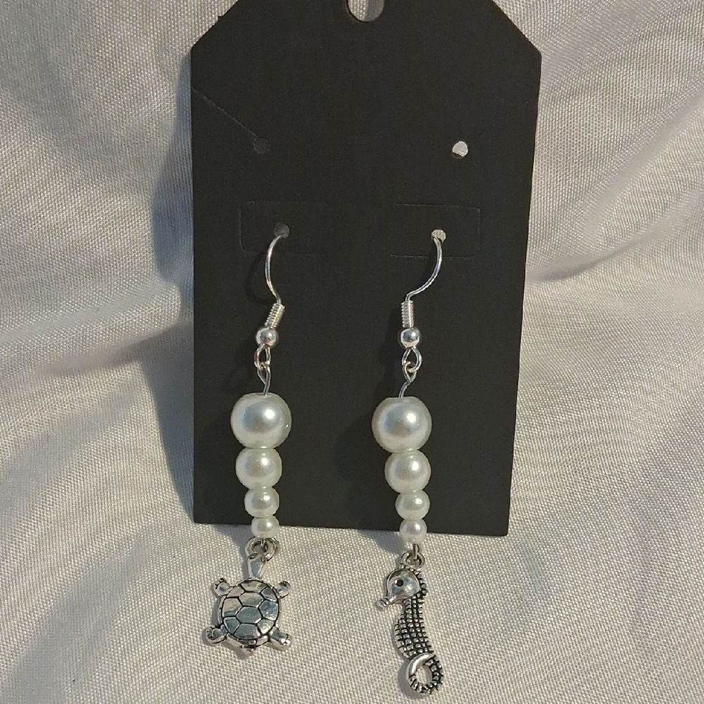 Elegant Pearl and Silver Charm Earrings